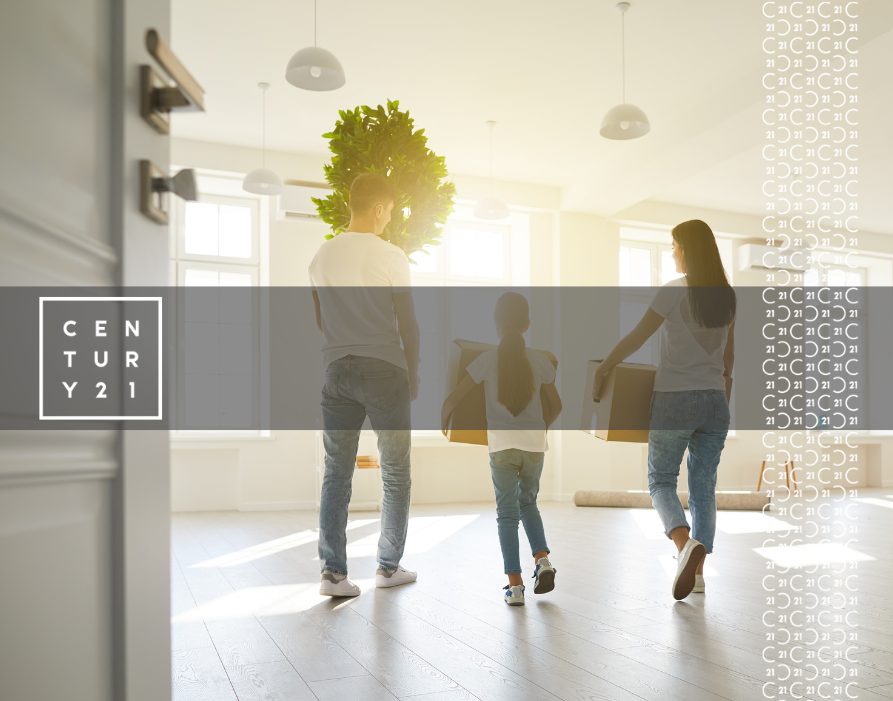 Happy-Family-with-Children-Moving-with-Boxes-in-a-New-Apartment-House.-Back-View 2